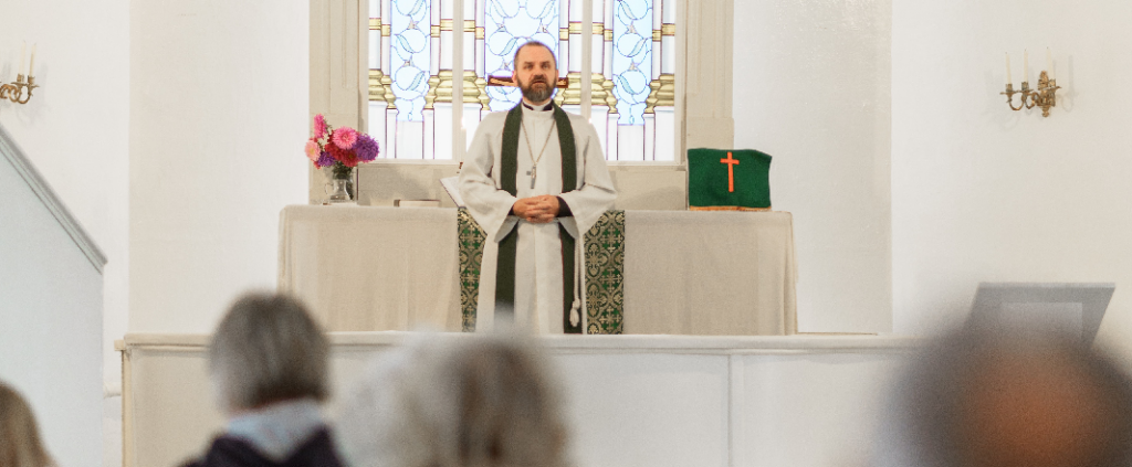 Preacher in nicely white church